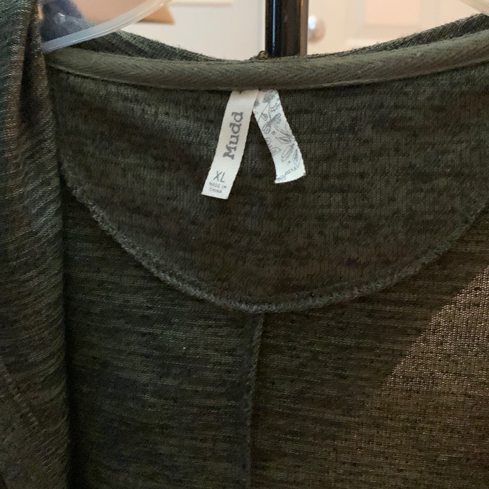 This is an extra large Deep green cardigan